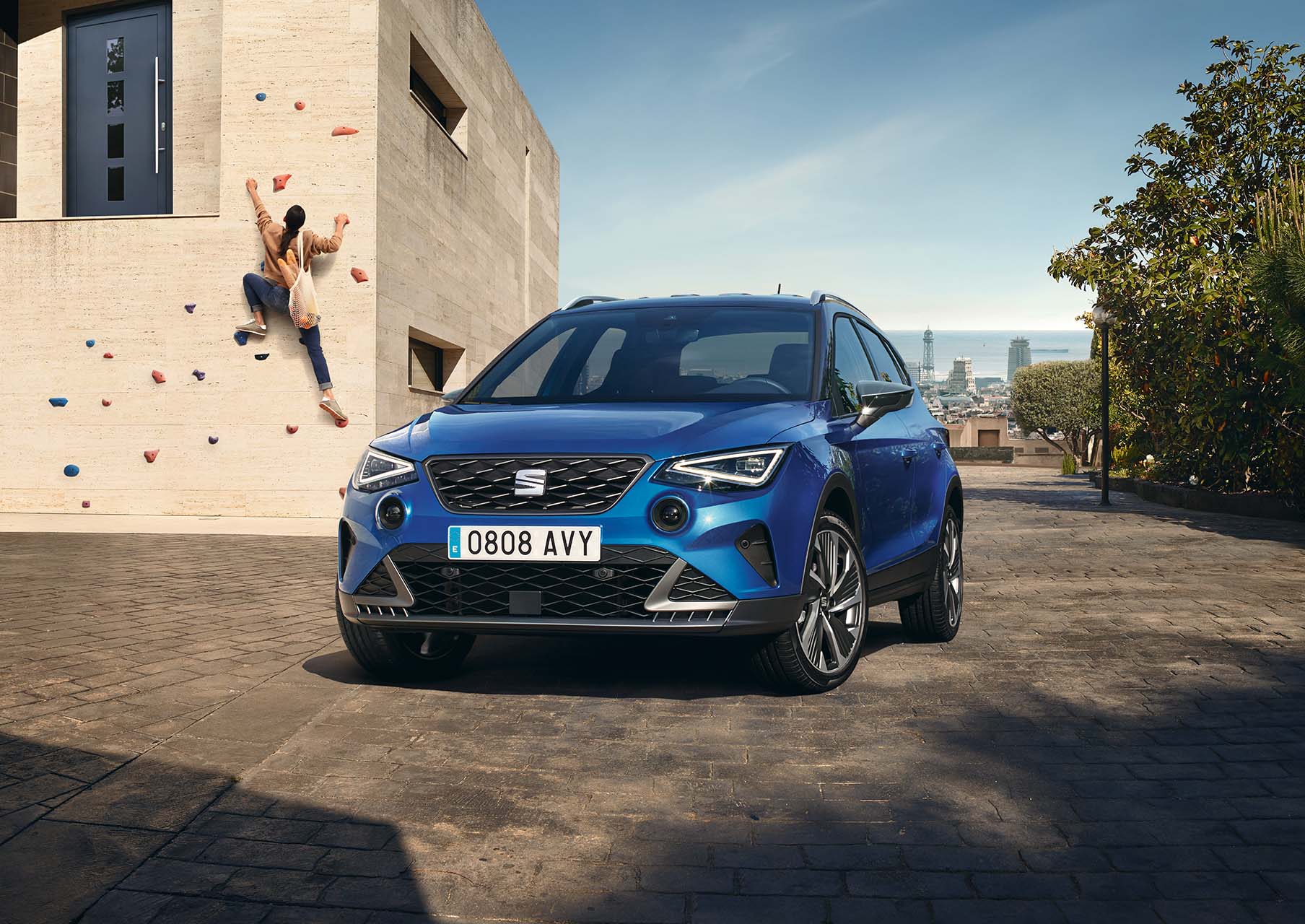 seat arona fr parked beside girl climbing wall