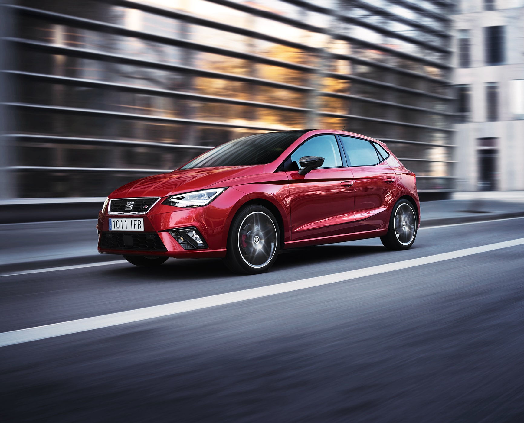 TGI hybrid car CNG petrol SEAT Ibiza red angular front view