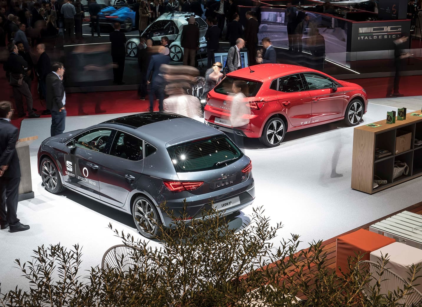 Image of SEAT stand with two cars showing at a Motor Show