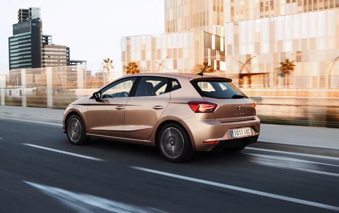 SEAT Ibiza on the road crossing the city